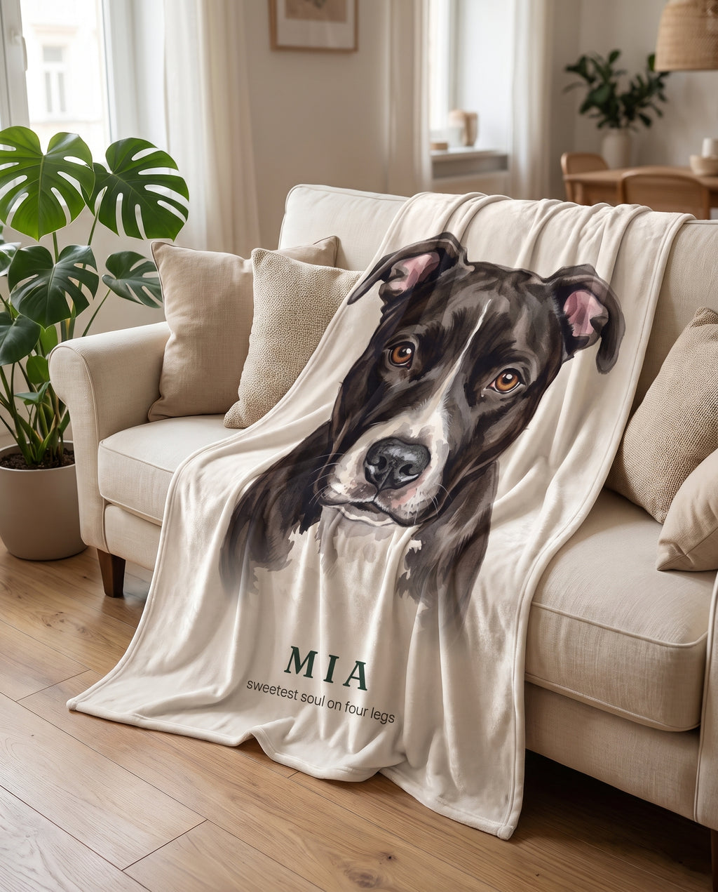 Mia's personalized dog portrait throw draped over a sofa in a living room.